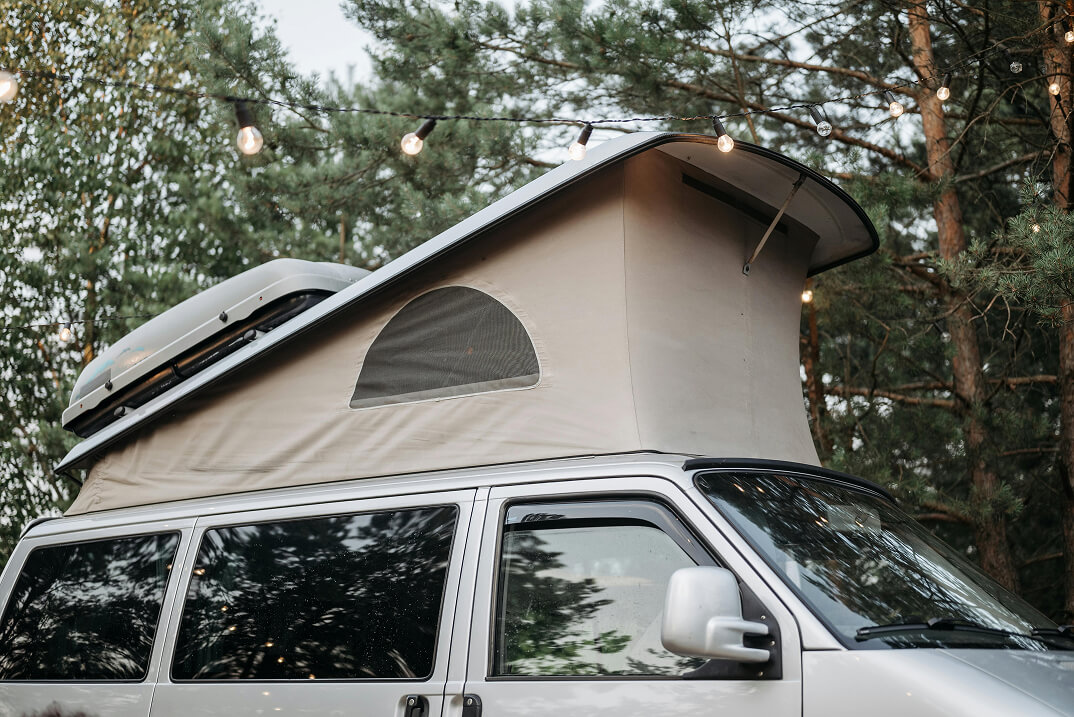 A campervan with a pop-top roof