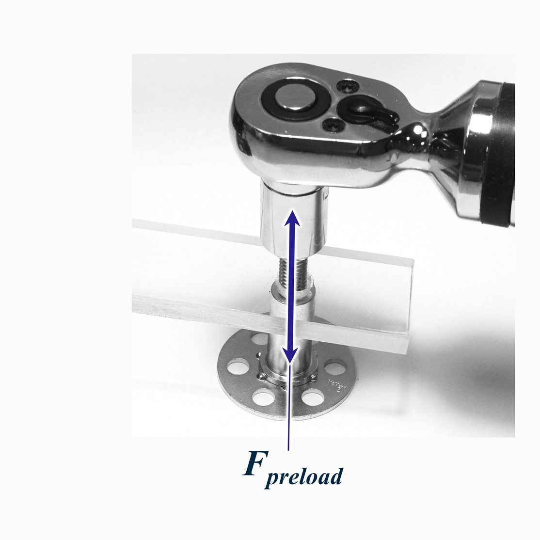 Photograph of a bigHead collar assembly and torque wrench illustrating preload generation with preload forces represented by a labelled arrow indicating "F preload".